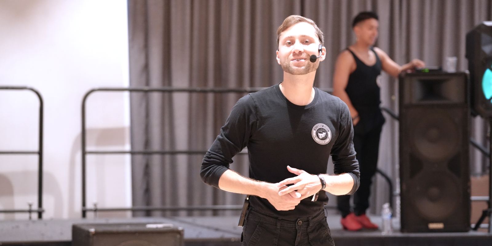 A couple performing a lift during a show at the California Dance Festival in 2025