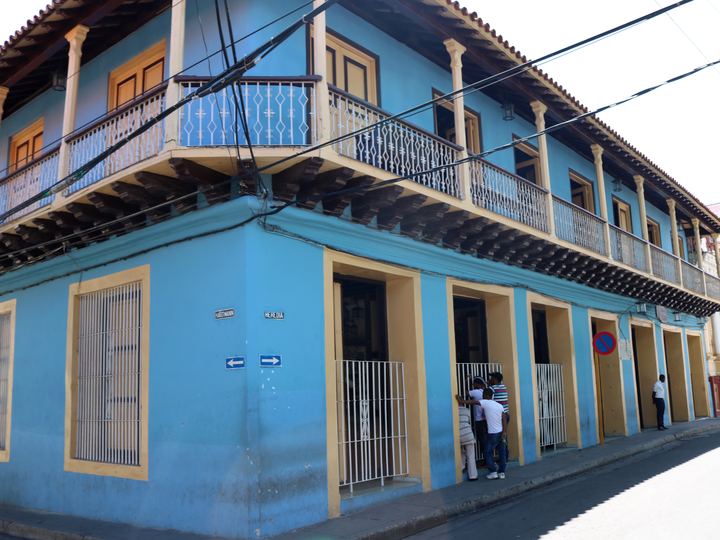 The blue colonial facade of the Casa de la Trova music house in Santiago de Cuba